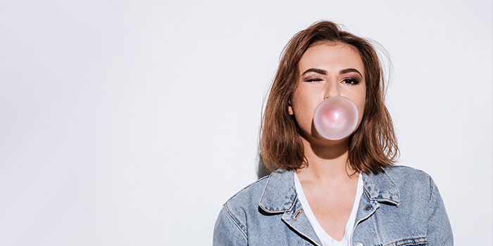 Girl Chewing Sugar Free Gum Bubble