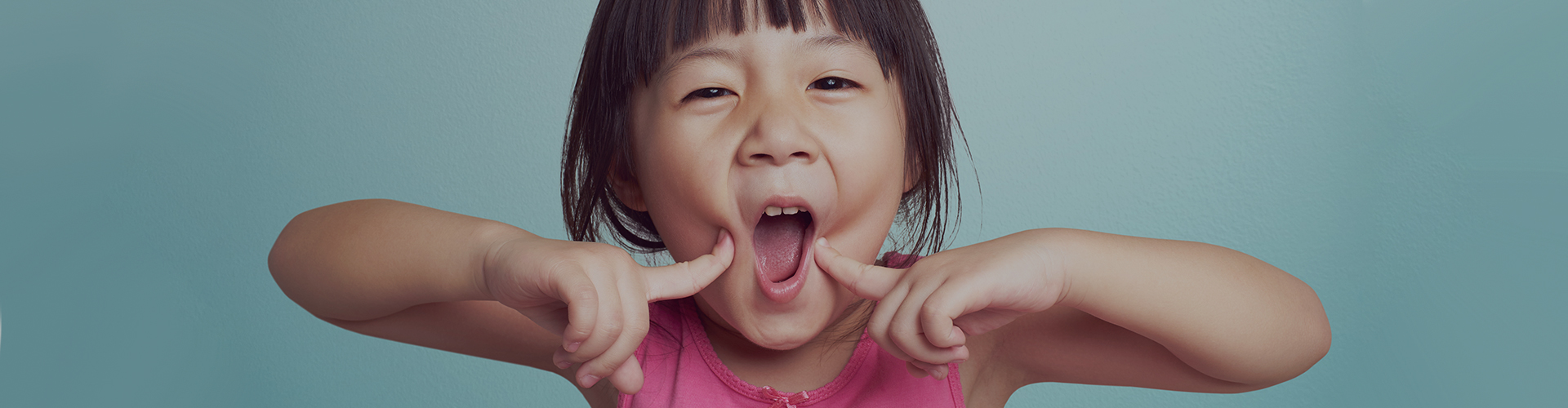Cavities in Baby Teeth Kid Pointing To Teeth