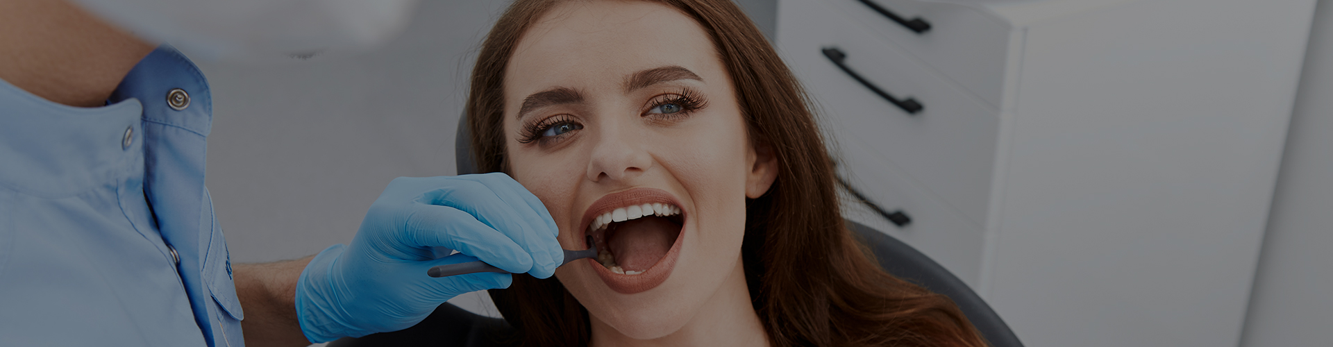 woman smiling no fear in dental chair seeing dentist