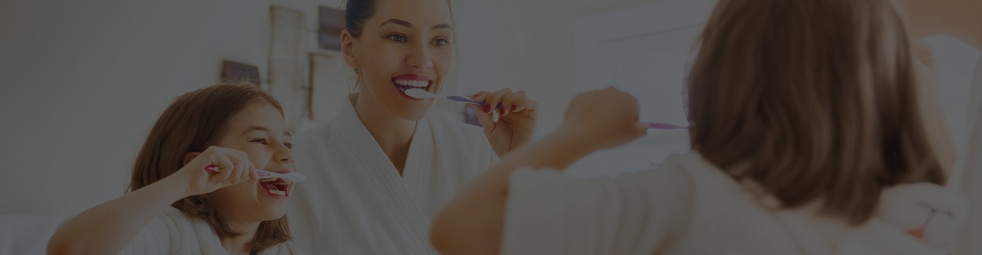 7 tips on how to take care of your teeth mum daughter brushing teeth
